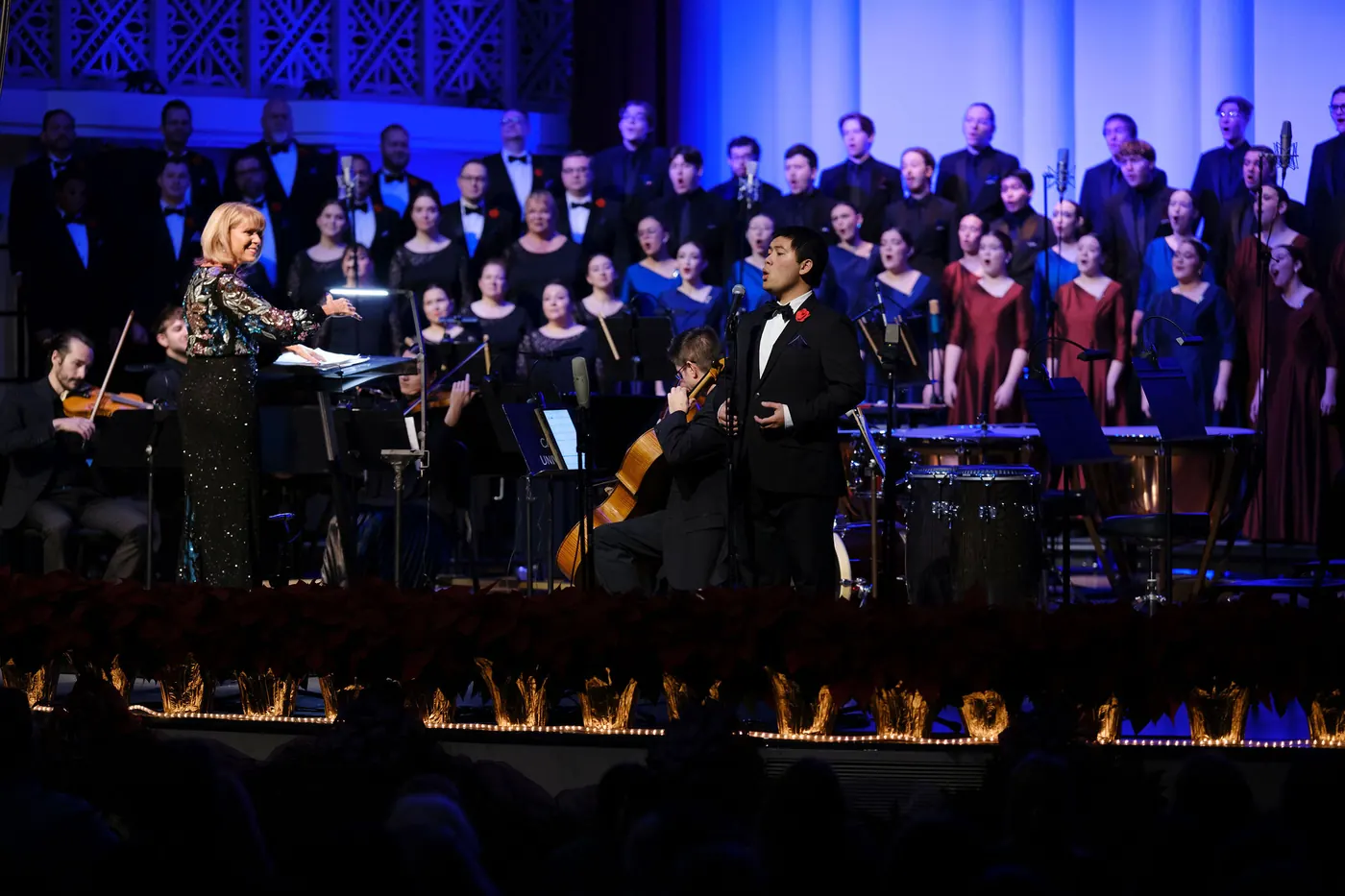 Conducting the choir with a soloist at the Christmas Festival